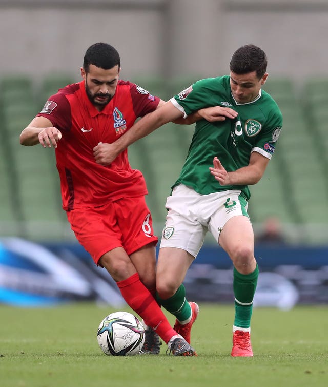 Republic of Ireland midfielder Josh Cullen (right) is refusing to give up on is qualification hopes