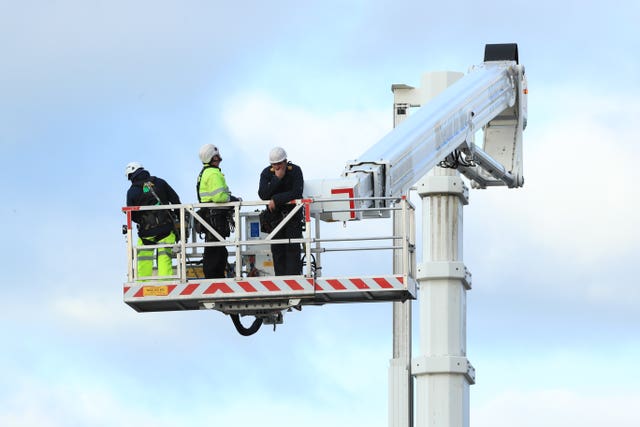 A cherry picker was used in the recovery operation (Danny Lawson/PA)