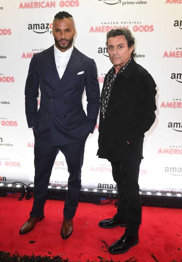 Ricky Whittle and Ian McShane 