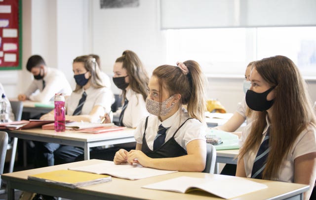 School pupils wearing face masks in class