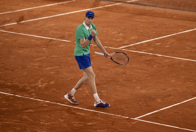 Jannik Sinner celebrates during his men’s singles semi-final match against Novak Djokovic