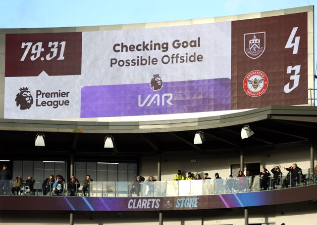 A screen at Turf Moor indicates a VAR decision will be made