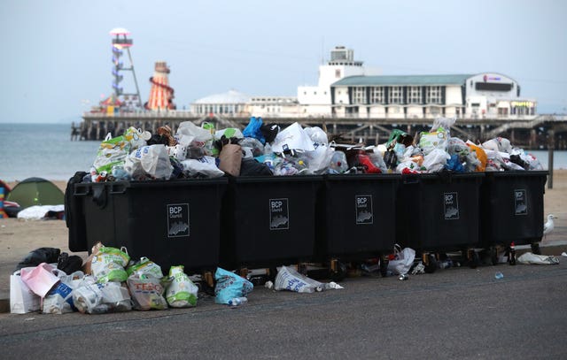 Waste ready to be collected after a busy day at Bournemouth beach