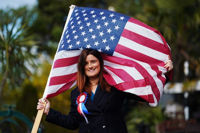Fifth cousin of President Joe Biden, Councillor Andrea McKevitt, waving an American flag