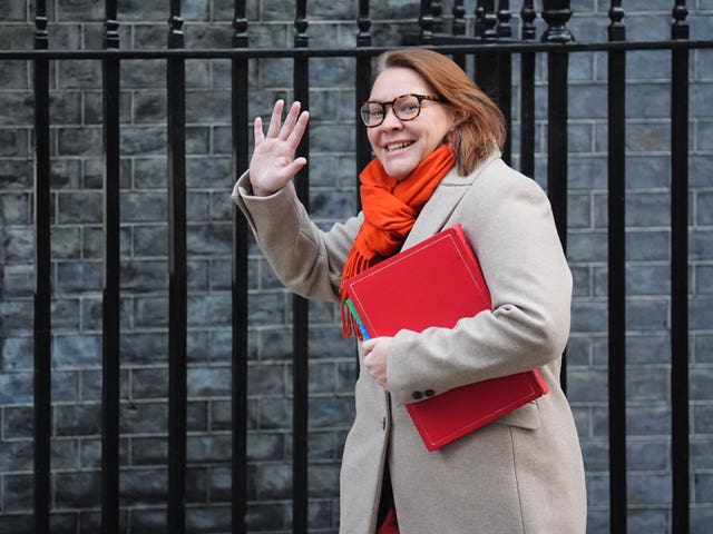 Anna Turley carrying a red folder as she walks along Downing Street