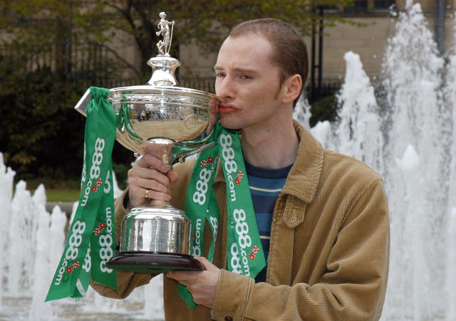 World Snooker champion Graeme Dott poses with his trophy in 2006 