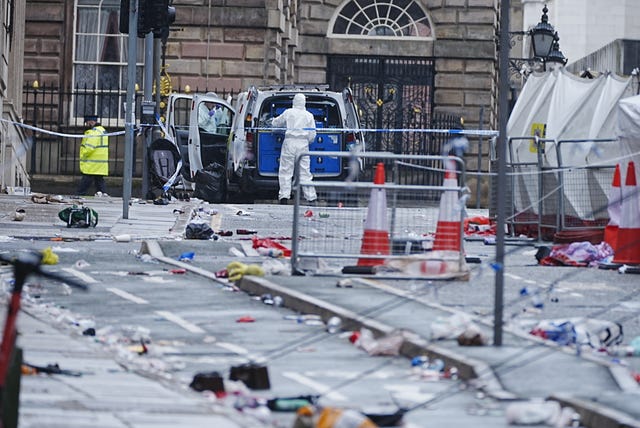 Forensic officers at the scene in Water Street 