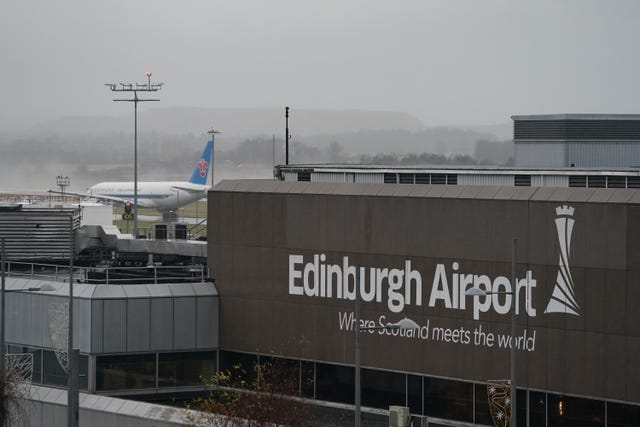 A general view of Edinburgh Airport with a plane on the runway