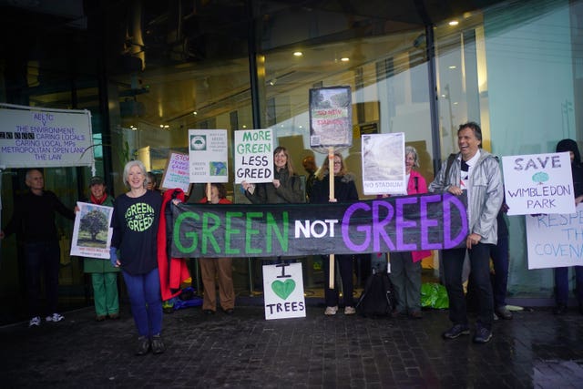 Protesters demonstrate outside City Hall ahead of the planning hearing in September