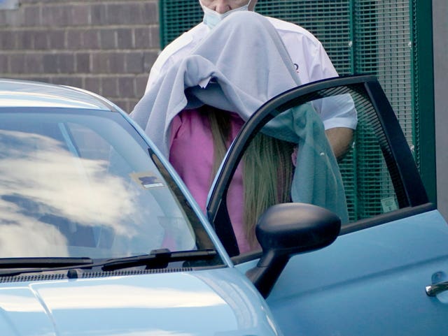 Katie Price, covered with a blanket, leaves Crawley Magistrates’ Court