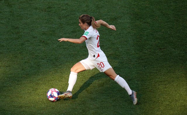 Karen Carney playing football for England