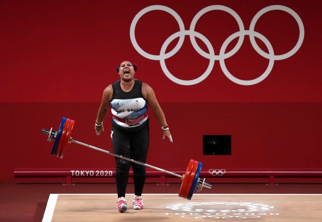 Great Britain's Emily Campbell celebrates taking silver during the +87kg weightlifting