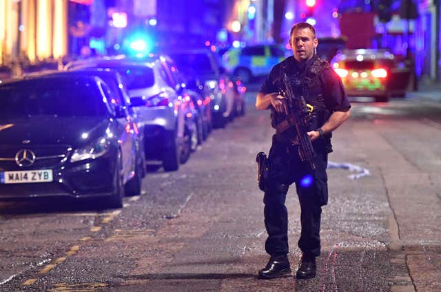 Armed police on Borough High Street at London Bridge, where a terrorist attack took place. (Dominic Lipinski/PA)