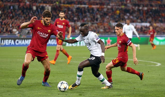 Roma’s Federico Fazio (left) in Champions League action against Liverpool. (Steven Paston/PA)