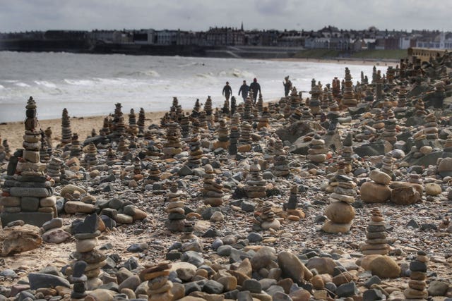 Pebble sculptures in Whitley Bay beach on the North East coast, while people are taking their daily lockdown exercise they have kept adding pebble sculptures transforming the beach as the UK continues in lockdown to help curb the spread of the coronavirus