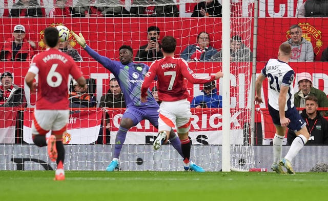 Dejan Kulusevski scores Tottenham's second goal as Andre Onana dives in vain