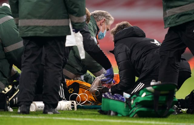 Wolves’ Raul Jimenez receives treatment after a clash of heads with Arsenal’s David Luiz