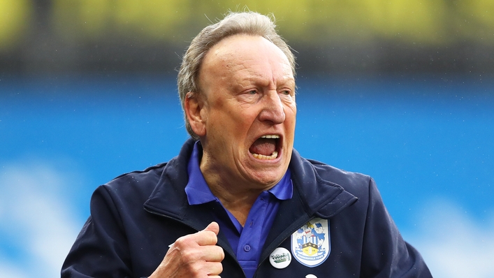 Huddersfield’s manager Neil Warnock celebrates (PA)