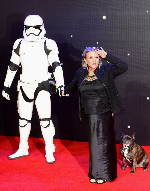Carrie Fisher with a Storm Trooper