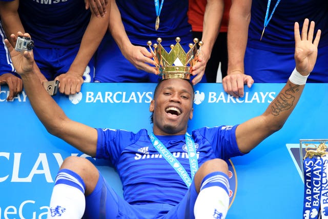 Didier Drogba celebrates Chelsea's 2014-15 Premier League title win