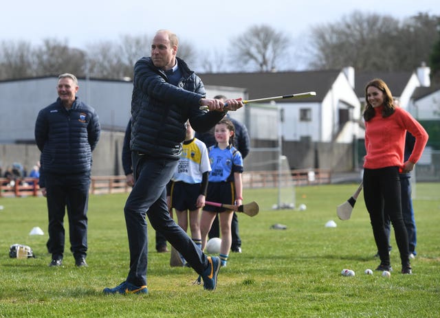 The Duke of Cambridge tries his hand at hurling at Salthill Knocknacarra GAA Club in Galway