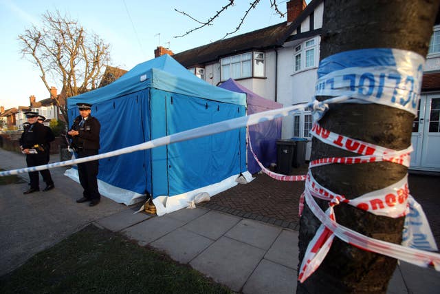 Police outside the home of Nikolay Glushkov in New Malden (Yui Mok/PA)