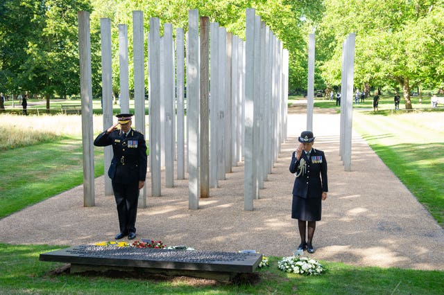 City of London Police Commissioner Ian Dyson and Metropolitan Police Commissioner Cressida Dick lay wreaths at the London Bombing Memorial in Hyde Park