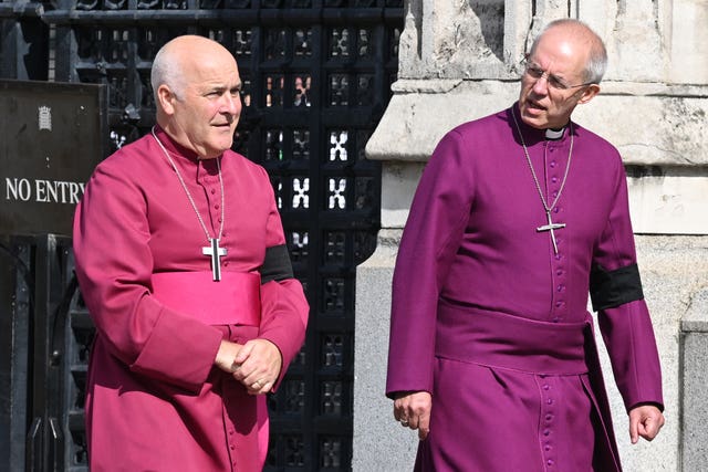 Archbishop of York Stephen Cottrell and Archbishop of Canterbury Justin Welby in purple robes