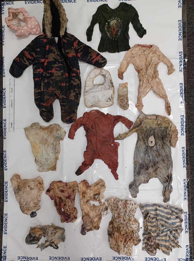 Some of the items, including a number of babygrows, found in Amblecote Playing Field and near the burnt out Peugeot 206 on the side of the M61 