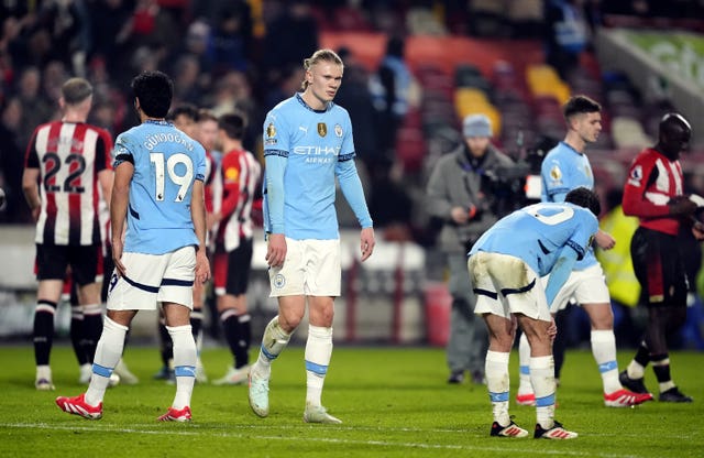 Manchester City’s Erling Haaland (centre) looks disappointed after the Premier League match at Brentford