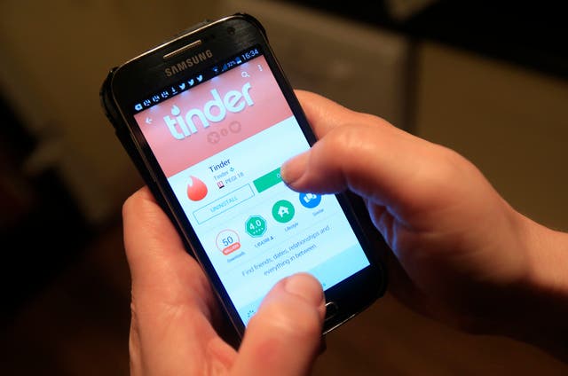 The Tinder app in use on a smartphone