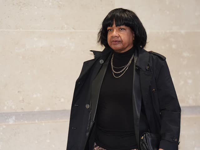 Diane Abbott walking along a street