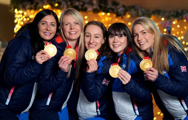 Great Britain curling gold medallists Eve Muirhead, Vicky Wright, Jennifer Dodds, Hailey Duff and Mili Smith at The Curling Club in The Langham Hotel, London (John Walton/PA)