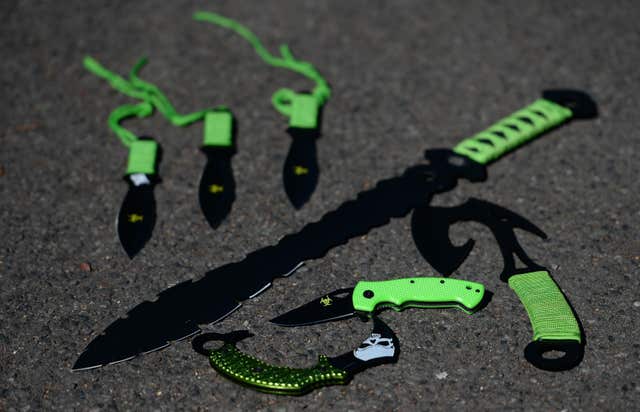 A set of zombie knives with bright green handles