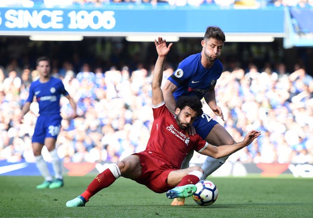 Liverpool forward Mohamed Salah was booked for diving after a challenge by Chelsea's Gary Cahill