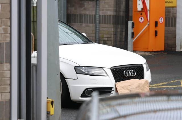 A white Audi car parked inside the police station in Lurgan, Co Armagh