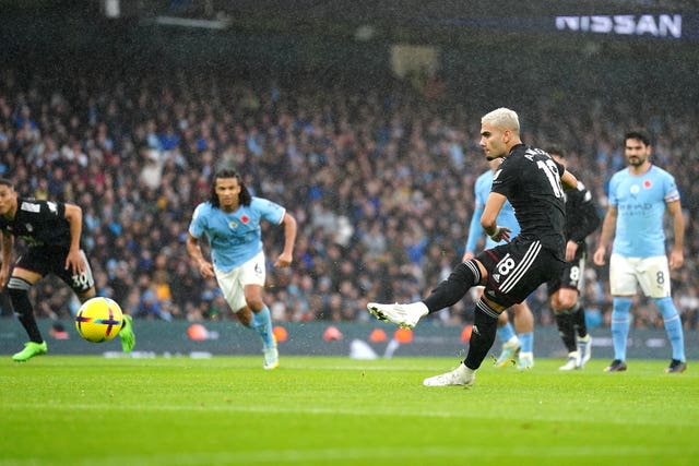 Andreas Pereira scores his first-half penalty 