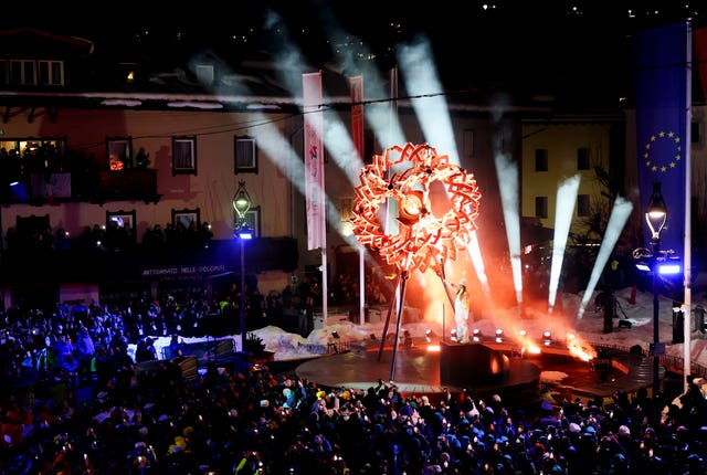 Olympic cauldrons were lit in both Milan and Cortina