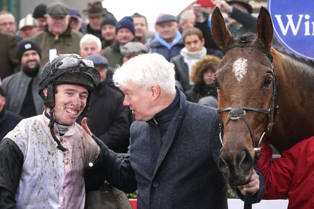 Owner Brian Acheson (centre) enjoyed a double at Naas on Sunday