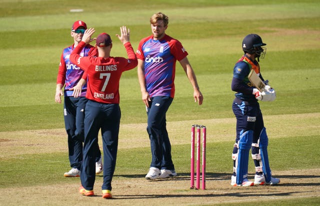 David Willey celebrates after taking a wicket 