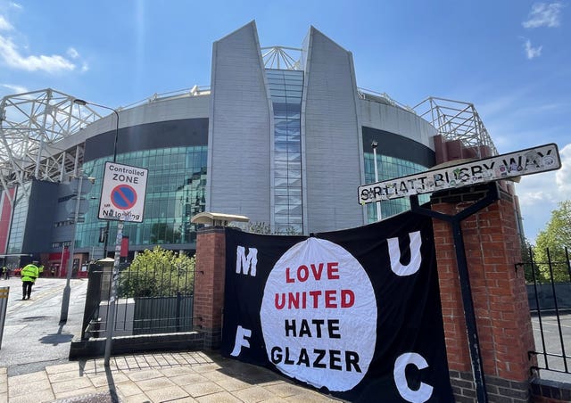 A flag reading Love United Hate Glazer