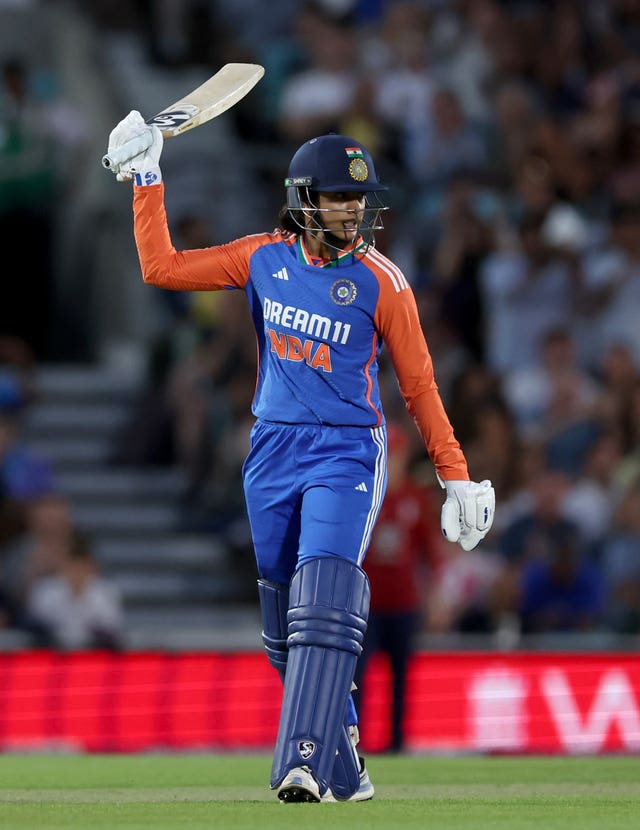 Smriti Mandhana celebrates reading 50 