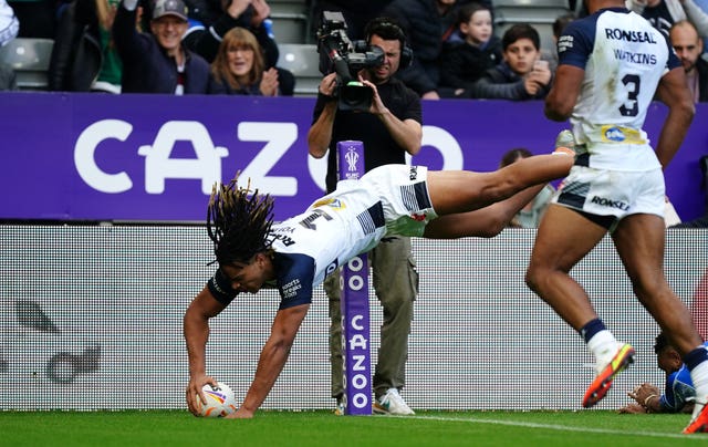 Dom Young dives in to score his second try of the game