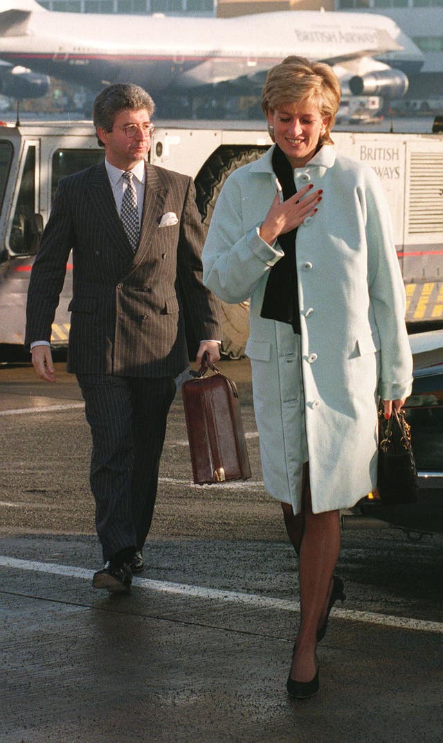 Diana with her then private secretary Patrick Jephson, at Heathrow Airport. Tim Ockenden/PA Wire