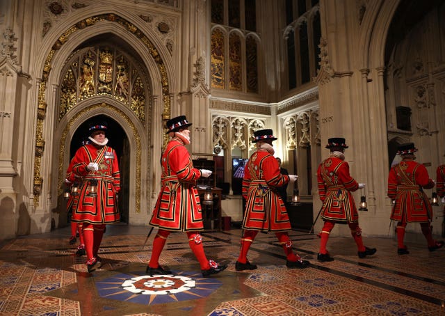 Yeoman warders arrive for the ceremonial search of the Palace of Westminster in London, ahead of the State Opening of Parliament in the House of Lords, London