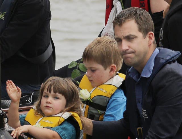 Brendan Cox, the widower of murdered MP Jo Cox, with their children Cuillin and Lejla, (Daniel Leal-Olivas/PA)