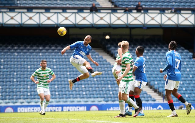 Rangers’ Kemar Roofe scores his side's third goal in a 4-1 win against Celtic