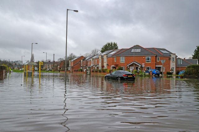 Flooded roads in West Derby, Liverpool (Peter Byrne/PA)