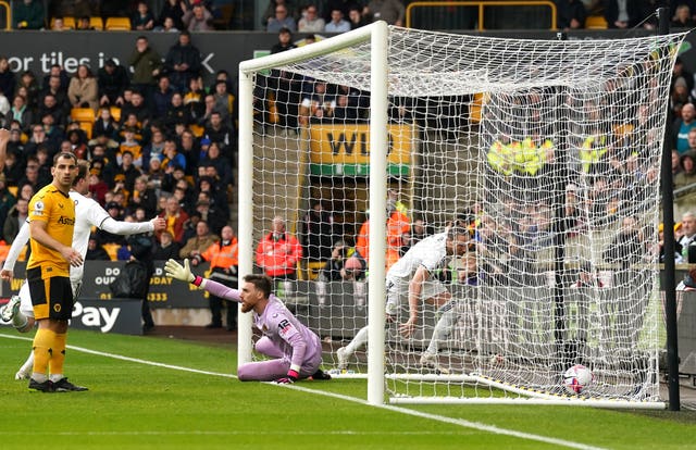 Luke Ayling, right, scores Leeds'' second goal of the game