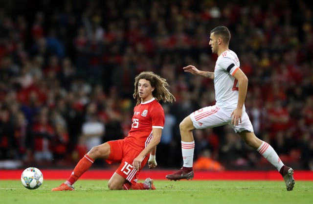 Wales’ Ethan Ampadu (left) had to leave the field through injury